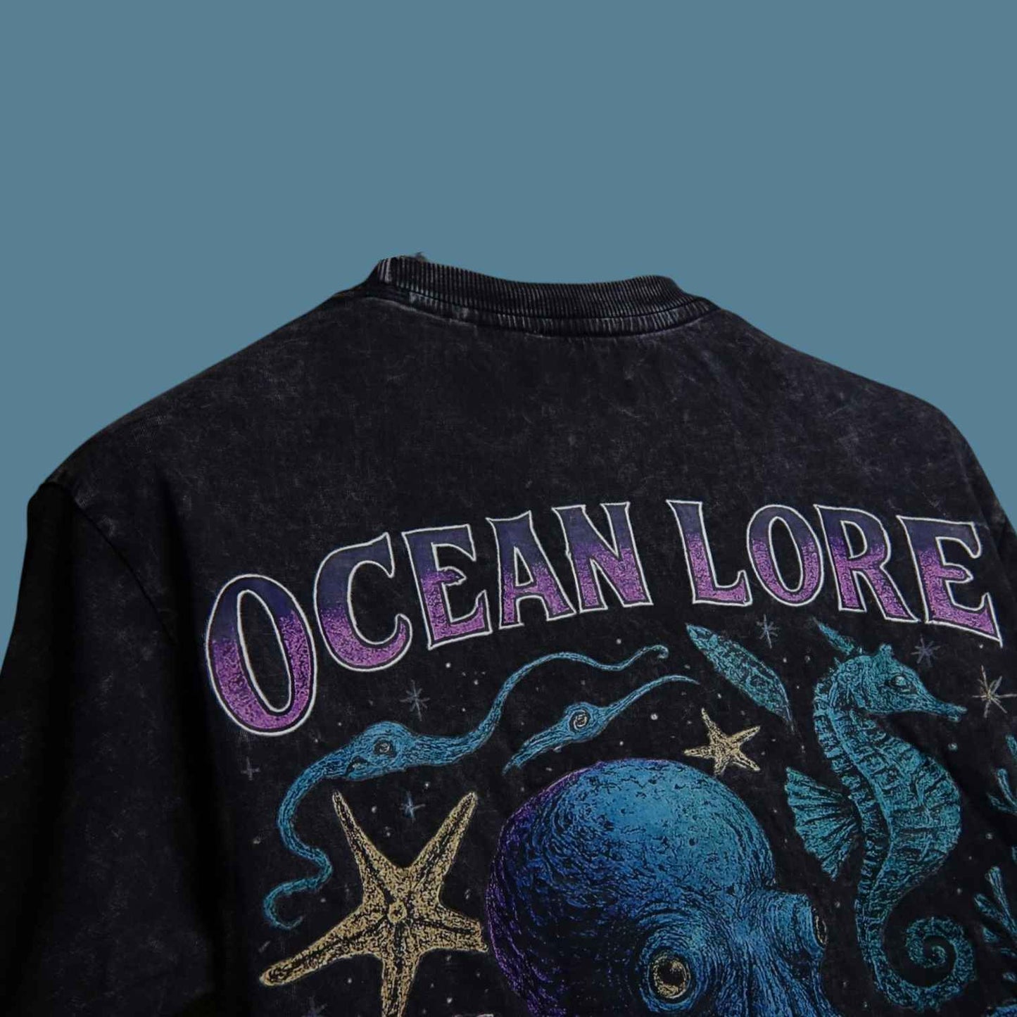 Detailed view of Ocean lore streetwear t-shirt back view, Premium Acid Wash