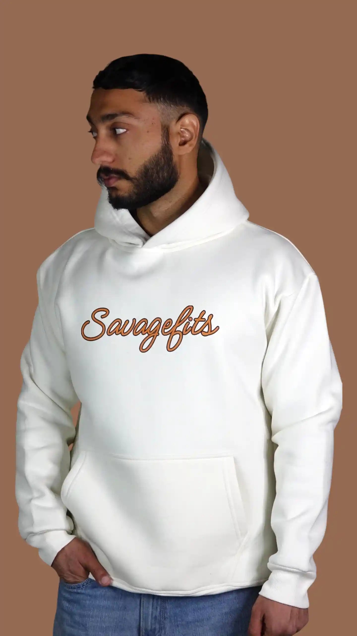 Person wearing a white hoodie with 'Savagefits' text on a brown background