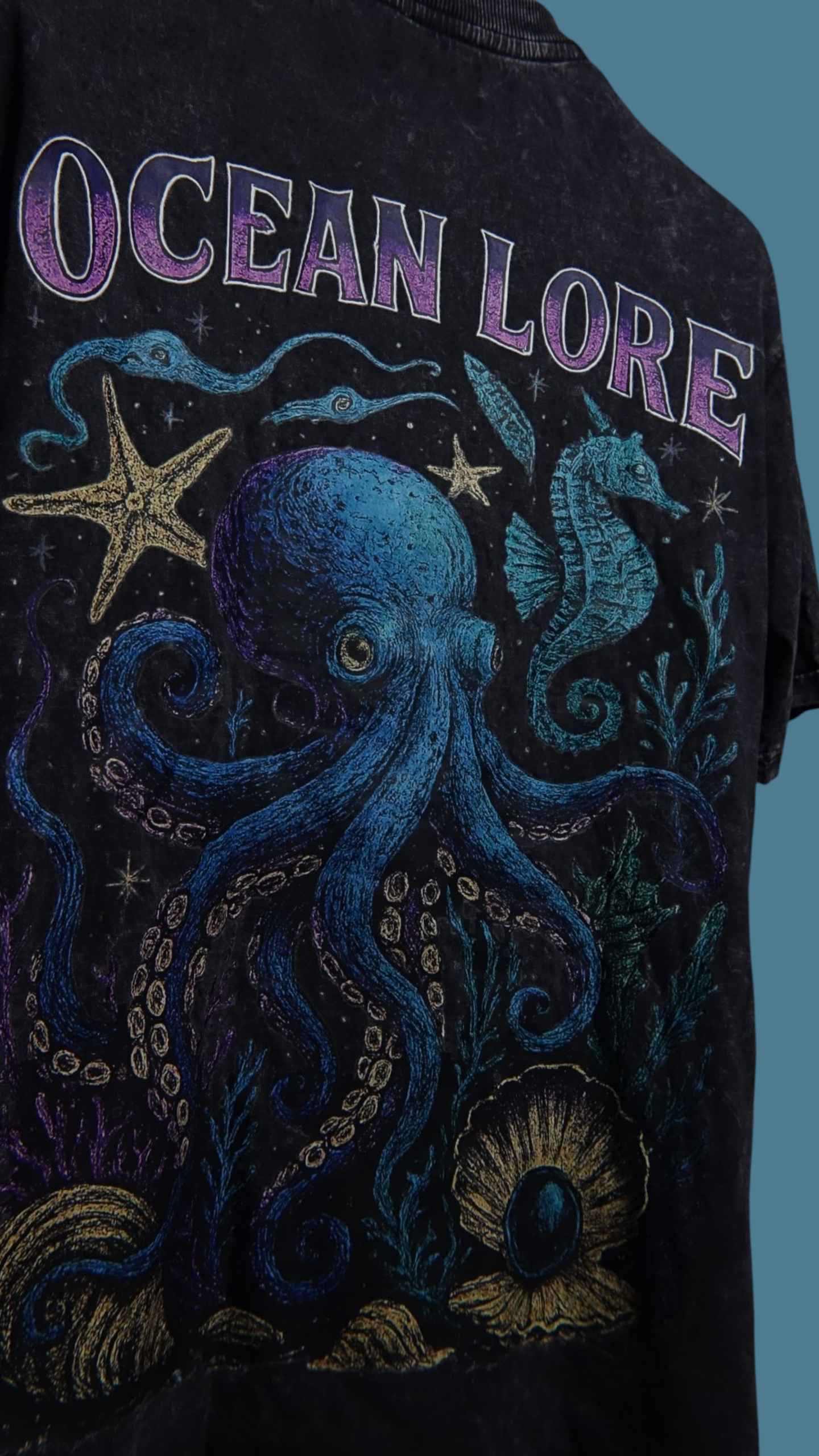 Detailed view of Ocean lore streetwear t-shirt back view, Premium Acid Wash